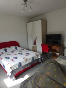 Postel nebo postele na pokoji v ubytování Guest house Sistem + 6 fotografií