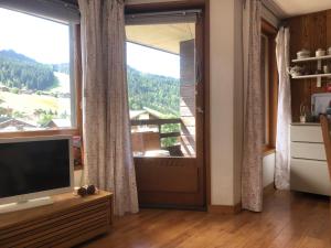 Gallery image of Bel app aux Gets 10mn centre ski parking tennis privé in Les Gets +21 photos