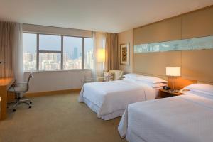 Ένα ή περισσότερα κρεβάτια σε δωμάτιο στο Four Points by Sheraton Shenzhen