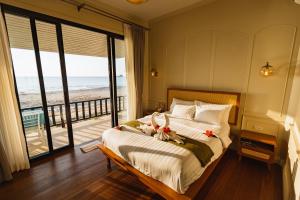 Postel nebo postele na pokoji v ubytování Sea Escape Koh Chang