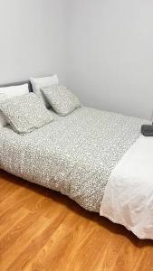 Postel nebo postele na pokoji v ubytování Apartamento bem localizado