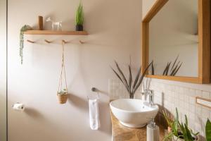 Ένα μπάνιο στο Woodlands Self Catering +40 φωτογραφίες