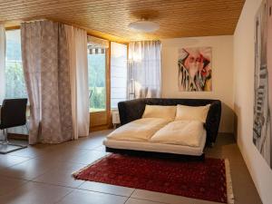 Posezení v ubytování Apartment Chesa Piz Cotschen 2 by Interhome