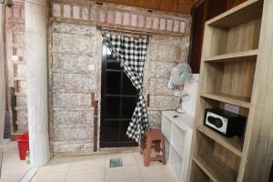 Kuchyň nebo kuchyňský kout v ubytování Seabreeze Hostel Bali