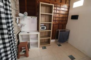 Kuchyň nebo kuchyňský kout v ubytování Seabreeze Hostel Bali