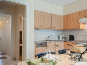 a kitchen with a table with a bowl on it at Apartment Rosablanche C64 by Interhome in Siviez