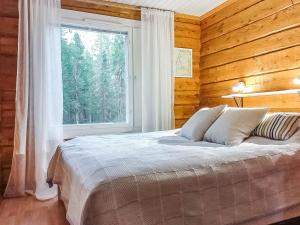 Posteľ alebo postele v izbe v ubytovaní Holiday Home Pelkkaveska by Interhome