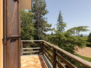 an open door to a balcony with trees at Villa Mareneve by Interhome in Linguaglossa