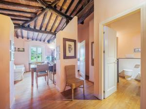 a living room with a table and a dining room at Apartment Casa del Gemmo by Interhome in Sestri Levante +26 photos