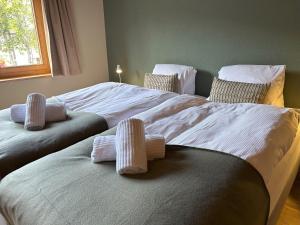 Postel nebo postele na pokoji v ubytování Pez Regina - Nordic Style Alps Hotel