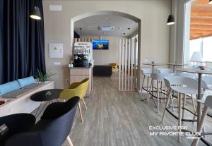 A television and/or entertainment centre at Alua Village Fuerteventura - All Inclusive