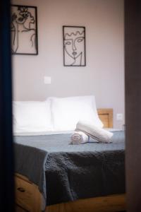 Postel nebo postele na pokoji v ubytování Casa con pozo Platamonas