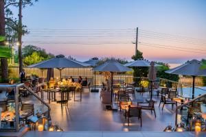 Een restaurant of ander eetgelegenheid bij Divani Apollon Palace & Thalasso