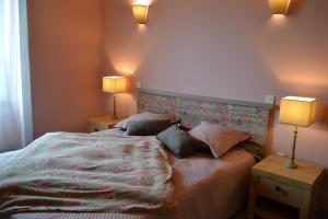 Cama o camas de una habitación en Gîte la Forge 4 étoiles