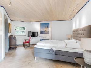 Voodi või voodid majutusasutuse Holiday Home Sjamme - 1-2km from the sea by Interhome toas