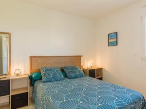Katil atau katil-katil dalam bilik di Holiday Home Kervennou by Interhome
