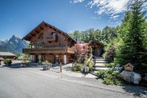 a large wooden house in the mountains at Au Rêve Savoyard 5 in Morillon