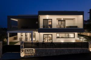 a rendering of a house at night at Sezian Boutique Homes and Villas in Preveza
