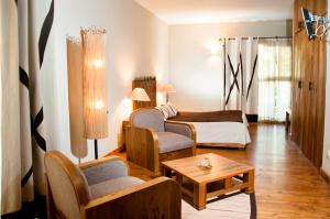 Posezení v ubytování Hôtel Restaurant LE COMBAVA