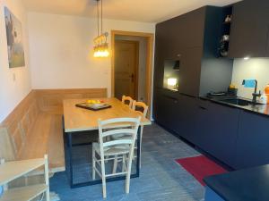 Kuchyň nebo kuchyňský kout v ubytování Apartment Margherita