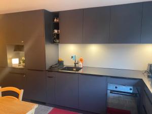 Kuchyň nebo kuchyňský kout v ubytování Apartment Margherita