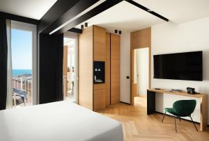 Телевизор и/или развлекательный центр в View Place & Spa