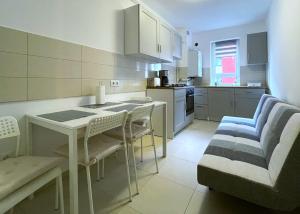 Kuchyň nebo kuchyňský kout v ubytování Bartolomeu Serenity Studio w. free parking