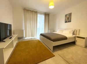 TV a/nebo společenská místnost v ubytování Bartolomeu Serenity Studio w. free parking