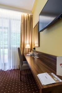 TV a/nebo společenská místnost v ubytování Hotel Podium