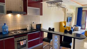 Kuchyň nebo kuchyňský kout v ubytování Shanzu Seabreeze Apartments