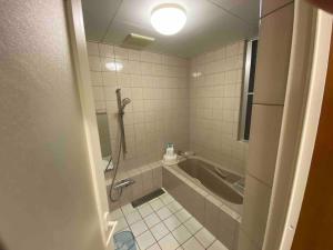 Vannituba majutusasutuses 貸切別荘カリイ Vacation Rental KALLY Naha Okinawa