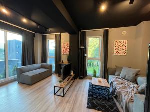 Ruang duduk di Mickitos Apartments - Mavrovo