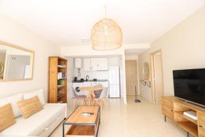 Η κουζίνα ή μικρή κουζίνα στο Beautiful apartment in Canet Playa by Hometels +8 φωτογραφίες