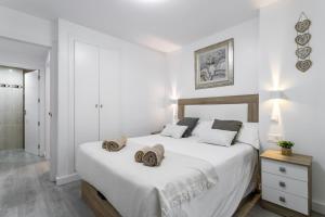 Posteľ alebo postele v izbe v ubytovaní Sur Suites Principe