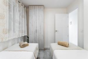 Posteľ alebo postele v izbe v ubytovaní Sur Suites Principe
