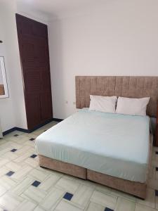 A bed or beds in a room at Med Residence family