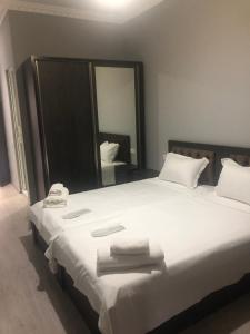 A bed or beds in a room at Hotel N