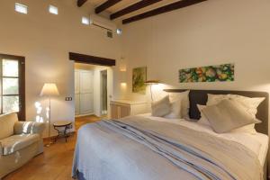 Posteľ alebo postele v izbe v ubytovaní Finca Can Coll Boutique Country House - Adults Only