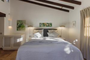 Posteľ alebo postele v izbe v ubytovaní Finca Can Coll Boutique Country House - Adults Only