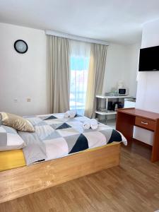 Postel nebo postele na pokoji v ubytování Apartments Sirena Korčula
