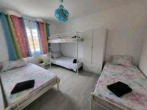 מיטה או מיטות בחדר ב-The Believers - Porto Santo