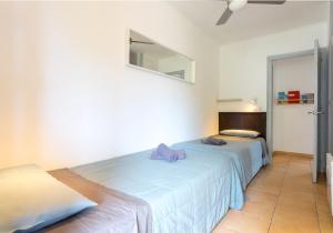Ένα ή περισσότερα κρεβάτια σε δωμάτιο στο Apartamento a 100 m de playa. Calella Palafrugell