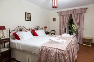 Postel nebo postele na pokoji v ubytování Casa da Azenha