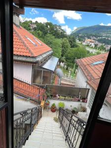 a view from a window of a balcony of a building at Apartman Kovači in Sarajevo
