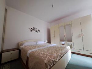Postel nebo postele na pokoji v ubytování Cozy Sarajevo City Apartment