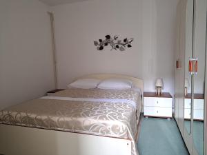 Postel nebo postele na pokoji v ubytování Cozy Sarajevo City Apartment