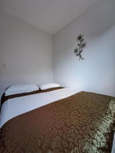 Postel nebo postele na pokoji v ubytování Cozy Sarajevo City Apartment