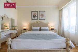 Postel nebo postele na pokoji v ubytování Prime Select San Stefano Alexandria