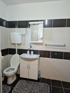 Ένα μπάνιο στο Apartman za odmor Jovanović +19 φωτογραφίες