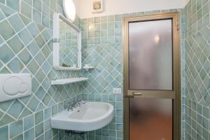 Koupelna v ubytování Agostino - Capo Testa